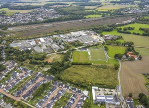 Aerial view, commercial area Schieferstraße and fallow land at the sports facility TuS Germania