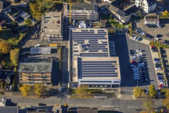 Aerial view, construction site and new building Heessener Gärten at the Aldi supermarket with solar