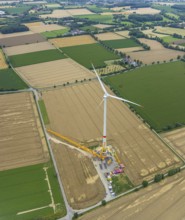Aerial view, meadows and fields with construction site and new wind turbine, Rhynern, Hamm, Ruhr