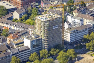 Aerial view, construction site, new building complex with residential tower and senior citizens'