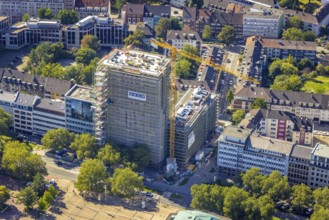 Aerial view, construction site, new building complex with residential tower and senior citizens'
