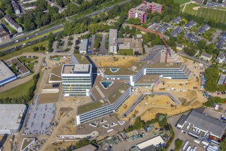 Aerial view, construction site and new construction ALDI-Nord Campus on the A40 motorway, Am