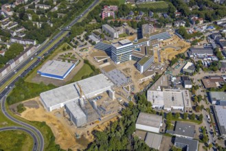 Aerial view, construction site and new construction ALDI-Nord Campus on the A40 motorway, Am