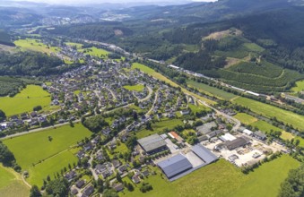 Aerial view, commercial area Bahnhofstraße at the edge of the forest on the Lenne and commercial