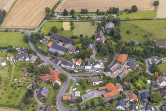 Aerial view, view of the village and evang. Village church at the cemetery in the Bausenhagen
