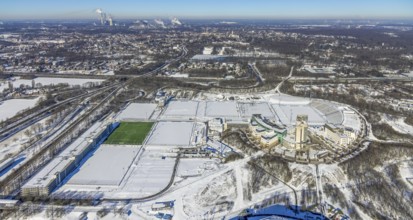 Aerial view, training ground and park stadium in the snow at the Veltins-Arena, Hotel Courtyard by