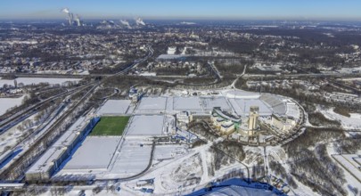Aerial view, training ground and park stadium in the snow at the Veltins-Arena, Hotel Courtyard by