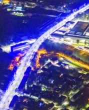 Aerial view, lighting in Schalke blue, Schalke 04, Kurt-Schumacher Straße with thyssenkrupp