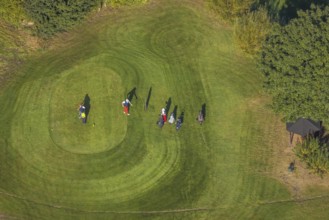 Aerial view, golf course golf club Schloss Horst and golf player on the green in the district Horst