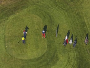 Aerial view, golf course golf club Schloss Horst and golf player on the green in the district Horst