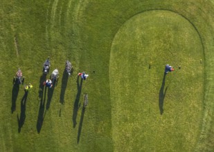 Aerial view, golf course golf club Schloss Horst and golf player on the green in the district Horst