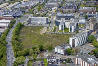 Aerial view, brownfield Schwanenkampstraße, construction site and new office building at the corner
