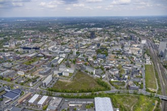 Aerial view, brownfield Schwanenkampstraße, construction site and new office building at the corner