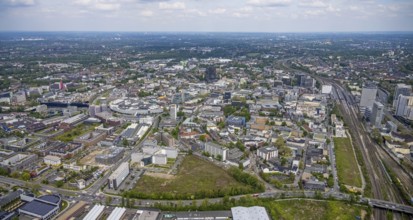 Aerial view, brownfield Schwanenkampstraße, construction site and new office building at the corner