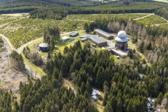 Aerial view, forest damage in a restricted military area, radar dome and radar station on Mount