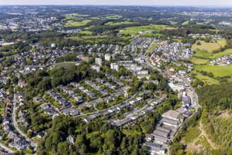 Aerial view, commercial area at Hembecker Talstraße and housing estate Büttenberger Straße in the