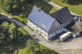 Aerial view, half-timbered house with solar roof in Oberhülsenbecke in the district Rüggeberg in