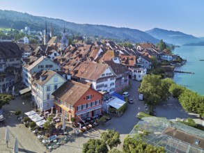 Old town with the Landsgemeindeplatz surrounded by street cafés and restaurants, behind the