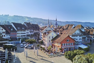 Old town with the Landsgemeindeplatz surrounded by street cafés and restaurants, behind the