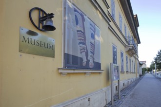 Bell museum building with inscription and banner, bell, town museum, GlockenStadtMuseum, Apolda,