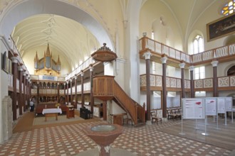 Organ, baptismal font, pulpit with pulpit bonnet, gallery, interior view of the neo-Gothic St