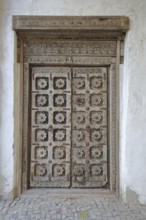 Door with wood carvings and floral decorations, castle, Wanzleben, Romanesque Road, Saxony-Anhalt,