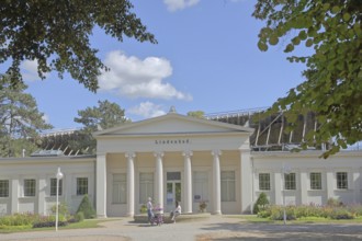 Classicist lime tree bath with columns, pedestrian, brine park, spa gardens, Bad Salzelmen,