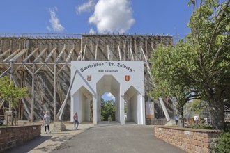 Portal to the spa gardens through the graduation tower, entrance, archway, inscription, Tolberg,