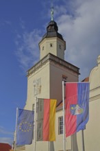 Renaissance town hall with EU flag, German national flag and town flag, three, flags, sundial, wall