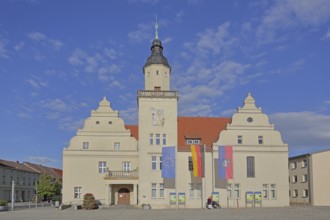 Renaissance town hall with EU flag, German national flag and town flag, three, flags, Coswig,