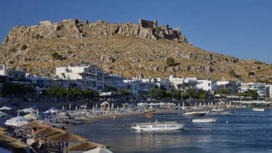 Feraklos Fortress, Feraklos, Picturesque coastal town with a castle on the hill and boats on the