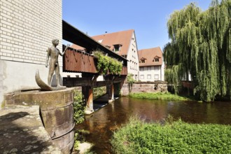 Ettlingen, Germany - August 13th 2025: Historic old town of Ettlingen Germany with wooden bridge