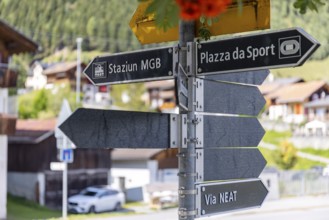 Signpost in the village to the museum, Via NEAT, church, Sedrun, Surselva, Graubünden, Switzerland