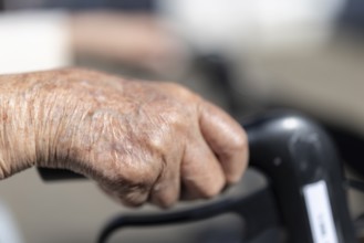Close-up of wrinkled hands of a 90+ year old senior citizen in a retirement home, Cologne, North
