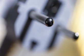 Close-up of a power plug, Schuko plug, with focus on the contact pins, symbol image for,