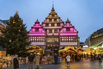 Christmas market at the colourfully illuminated Paderborn Town Hall at duskin Paderborn, North