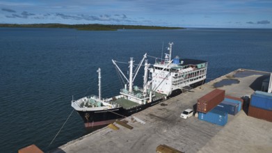 Ferry and supply vessel freighter Micronesian Navigators moored in the harbour of Colonia capital