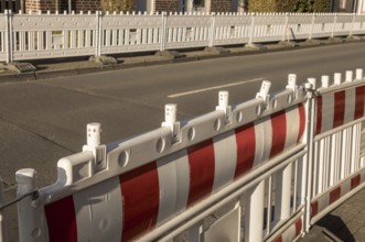 Borken, NRW, Germany, Red and white plastic roadblock securing a construction site, ensuring safety