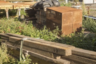 Borken, NRW, Germany, Various construction materials, including wooden planks and rusty metal