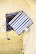 Hiding place of a pigeon, symbolic image for renovation needs, Germany
