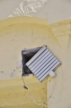 Hiding place of a pigeon, symbolic image for renovation needs, Germany