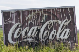 Old advertising sign Drikk Coca-Cola in a field, advertising for Coca-Cola, Jessheim, UIllensaker,