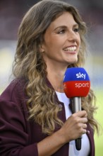 SKY presenter Mara Mones, portrait, smiles, interview, microphone, mike, logo, Voith-Arena,