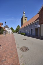 Streets, church tower of St. Johannis, historical buildings, pointed roof with red roof tiles,