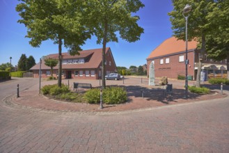 Roads, bollards, trees, bench, 1000 year fountain, shady, clinker pavement, concrete paving stone