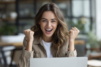 Emotional business woman showing happiness. Concept of winning and achieving corporate goals and