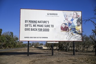 Advertising board of the Namibian diamond company NAMDEB, Oranjemund, diamond restricted area,