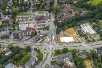 Aerial view, construction site and new building at the intersection of Sittardsberger Allee and