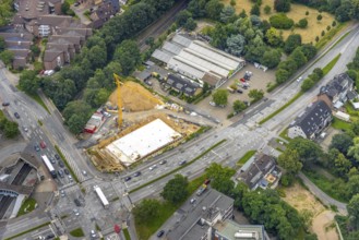Aerial view, construction site and new building at the intersection of Sittardsberger Allee and