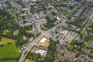 Aerial view, construction site and new building at the intersection of Sittardsberger Allee and
